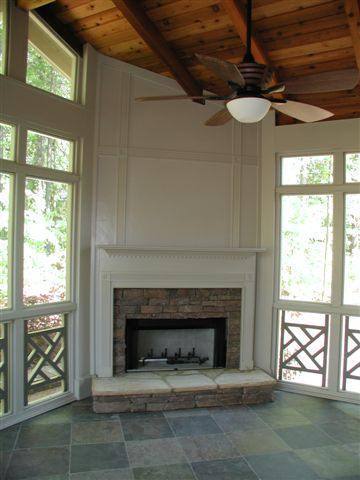 Screened in patio and outdoor fireplace